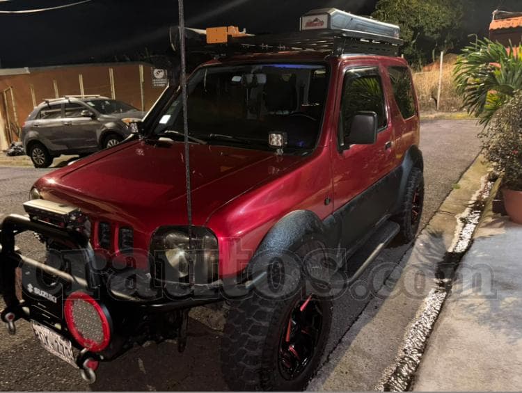 Suzuki JIMNY 2012 - foto 1
